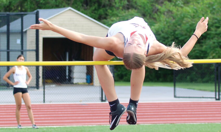 Hillsboro freshman Jaida Linn elevates over the bar during the high jump at the Civic Memorial Sectional on Thursday, May 9. Linn went on to take first at the sectional, qualifying her for the IHSA Class 2A State Track and Field Championships on May 17, in Charleston.