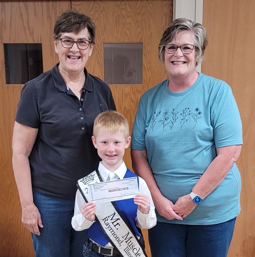 Pictured above, 2023 Raymond Mr. Muscle Jesse Carron presents a check for $1,000.19 to MCCA board member Susie Galer, at left, and MCCA Vice President Joyce Lipe, at right.