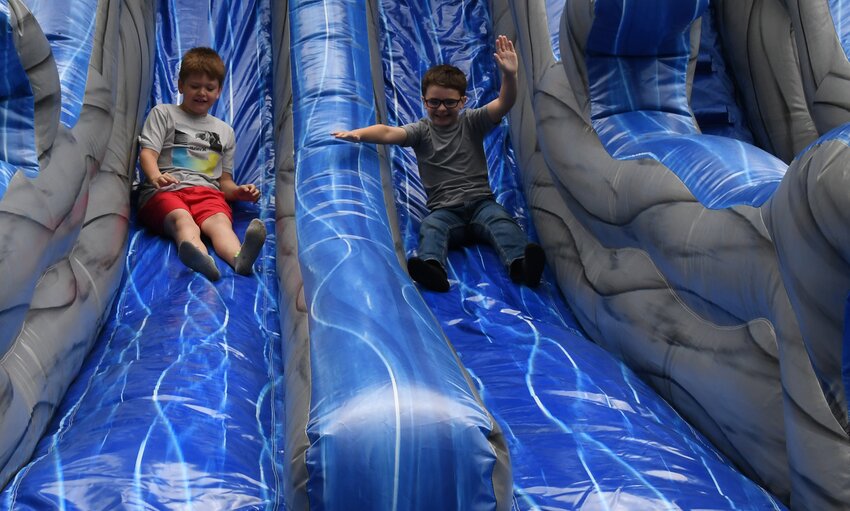 With less than a week left of school, Beckemeyer Elementary School students started the summer celebration a little early with an Inflatables Day on Wednesday, May 15. It was originally scheduled for Tuesday, but was moved due to inclement weather. Students in all grade levels enjoyed an obstacle course, a giant slide and a bounce house. Pictured above, second graders Grayson Ghattas and Wyatt Neer are all smiles on the slide. The last day of school in the Hillsboro School District is May 22.