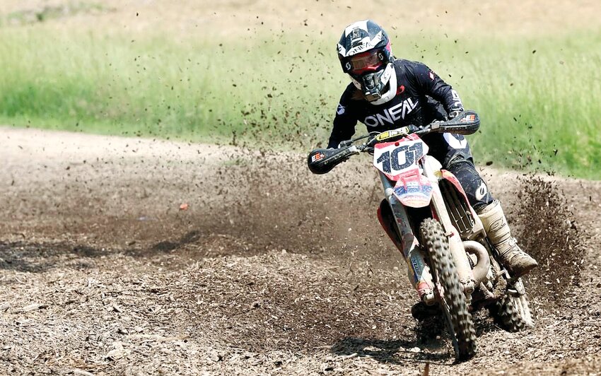 Litchfield racer Ryan Komor leaves a flurry of mud in his wake as he continues his lap in round two of the SO. IL Off Road Racing Series in Carlinville on May 19. Komor went on to finish third in the Open A class.