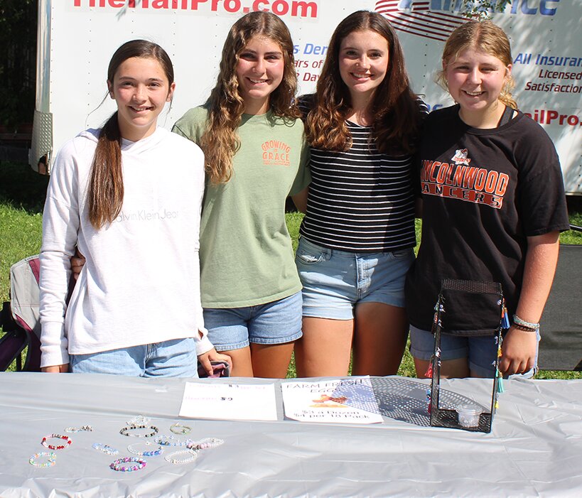 Pictured above, from the left, Lilyan Horath, Lillian Horath, Hannah Hill and Olivia Hill came together at the Doyle Public Library farmer&rsquo;s market to sell farm fresh eggs and handmade bracelets to Raymond residents.
