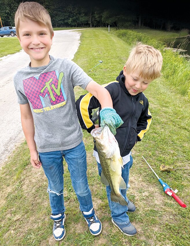 Ben and Alex Imel took advantage of the new youth fishing pond at the Glenn Shoals Lake North Access Area. Ben (left) landed a good sized bass, while Ben snagged several bluegill throughout the fishing excursion.