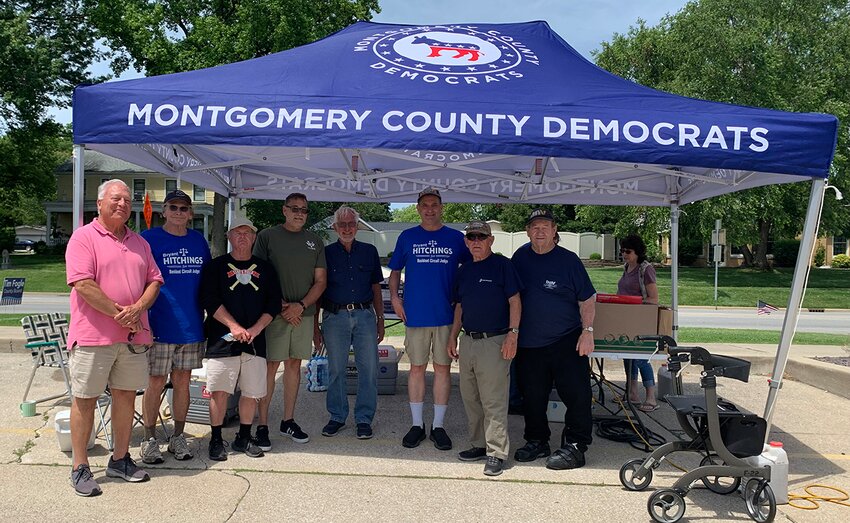 Montgomery County Democrats recently held a fundraiser for the Witt Veterans Memorial on Saturday morning, June 8, at the CNB Bank and Trust parking lot in Hillsboro. The meal consisted of a New York style hot dog, chips, a cookie and water. The meals sold out in less than three hours and raised $1,254 towards the Witt Veterans Memorial. The group has recently held fundraisers for the Coffeen Veterans Memorial, Irving CRC Recovery and many other organizations in need. Pictured above, from the left, are Mike Glenn, Chuck Napier, Jimmy Evans, Paul Sellers, Randy Singler, Chris Dahler, Dale Walcher of the veteran's committee and Bill Hartman of the veterans' committee. Not pictured, but working, were Chuck McDowell, Donna Dahler with the Democratic committee, Donna Yeske, Denise Kistner and David Cearlock with the veterans' committee.