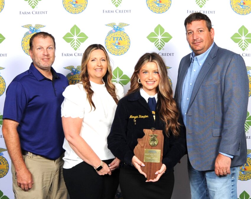 Morgan Hampton of the Lincolnwood High School FFA program was selected as the State FFA Proficiency winner in specialty animal production at the Illinois State FFA Convention. Pictured above, from the left, are parents Phil and Cassandra Hampton, Morgan Hampton and Lincolnwood FFA advisor Monte Elvidge.