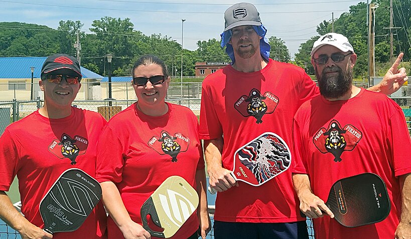 The team members of the first place team, the Poach Pirates, from left, are Will Adkins, Kayla Adkins, Ben Loftus and Kevin Guinn.