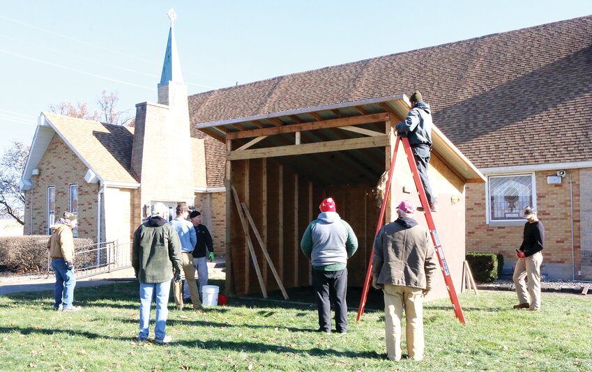 &quot;For unto us a child is born.&quot; Volunteers helped to set up the stable and other set pieces on Saturday morning, Dec. 7, to get ready for this years' 38th annual Live Nativity at the Calvary Baptist Church in Hillsboro. This year's event will be held  Dec. 19 through Dec. 23, from 6:30 to 8:30 p.m. each night.