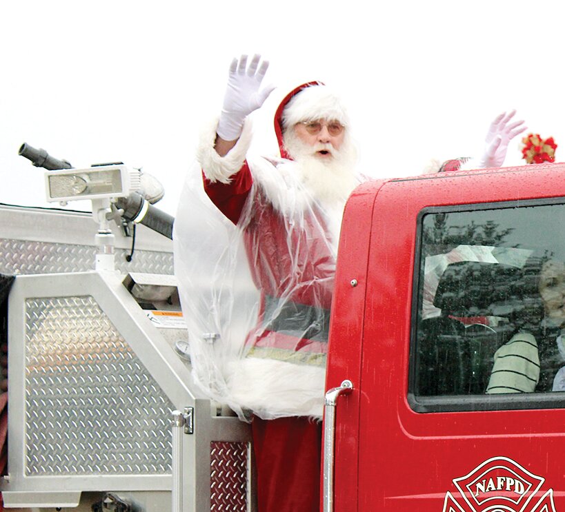 Amidst less than ideal weather, Santa Claus and Mrs. Claus still made their much celebrated annual visit to Nokomis on Saturday, Dec. 14 as part of this year's Snowkomis celebration. After leading the parade, Old St. Nick stopped by the Nokomis Public Library, where kids of all ages came to visit. See page 10A for more photos from this year's festivities.&nbsp;
