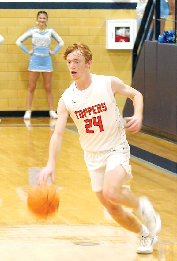 Mark Mattson had a team-high 14 points in Hillsboro's narrow 42-40 loss to Cumberland at the St. Elmo Tournament on Thursday, Dec. 19, which sent the Toppers to the third place game. Mattson and the Toppers bounced back in Saturday's tournament finale, beating St. Elmo/Brownstown 63-50.