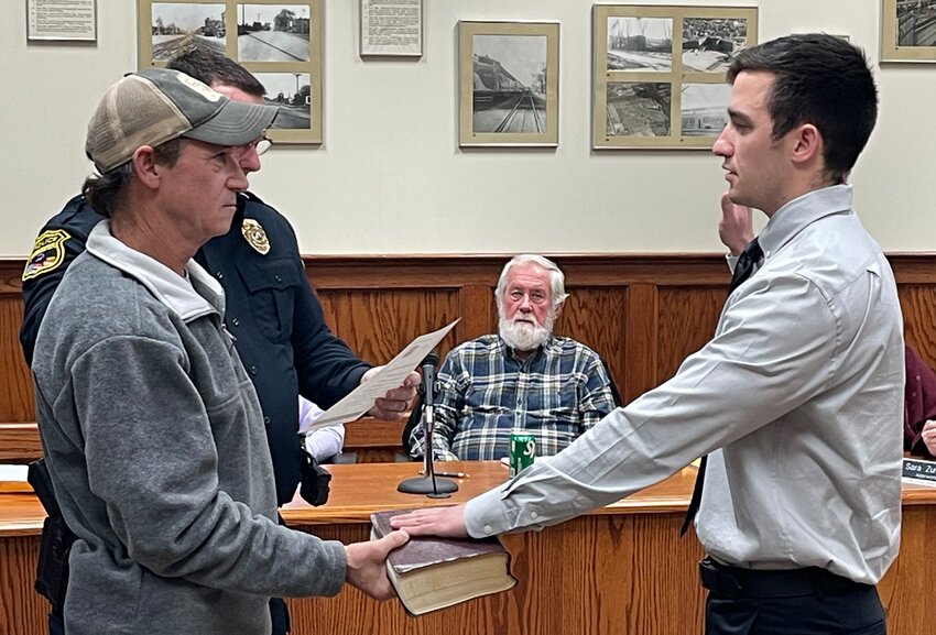 Accompanied by his father, Jeremy, Broc Jennings is sworn in as the newest member of the Litchfield Police Department by Chief Kenny Ryker. Jennings, a graduate of Waverly High School, is also an active member of the Illinois Air National Guard.