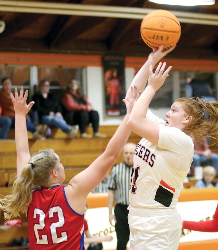 Lincolnwood's Lilly Terneus pops a shot over Pawnee's Clara Brunner during the Lancers' home game on Jan. 9. The Lancers rallied from a 16-point deficit to take a fourth quarter lead, before Pawnee pulled out a 41-32 victory on the road.