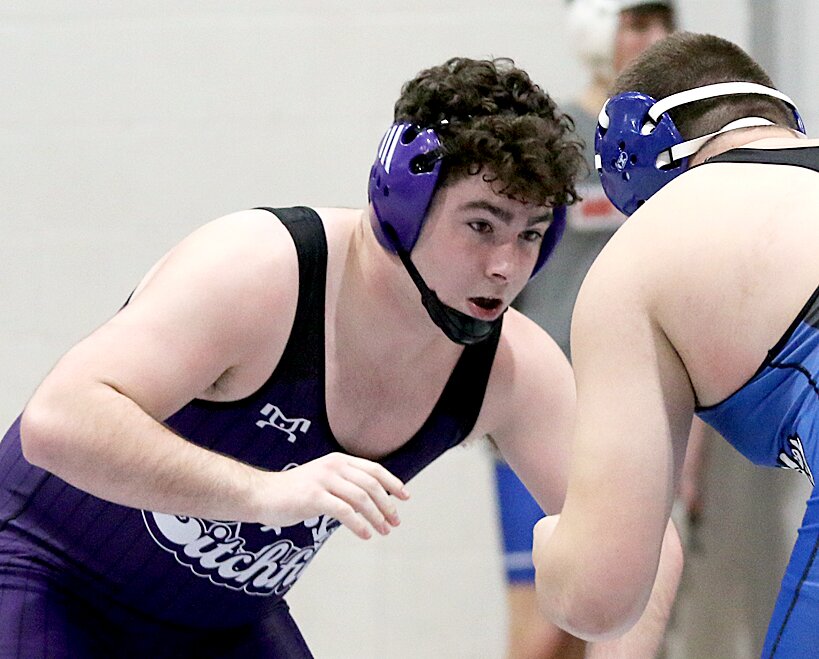 Litchfield's Devin Hansel measures up Sparta's Dylan Heinen during their match at the Rich Lovellette Invitationals on Friday, Jan. 31, in Litchfield. Despite wrestling up a weight class, Hansel pinned Heinen at the 2:53 mark of the match to move on to the quarterfinals.