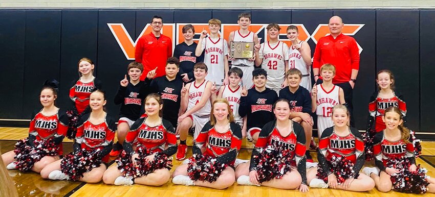 The Morrisonville-Lincolnwood seventh grade boys basketball team defeated New Berlin 52-47 in overtime on Jan. 30, to win the IESA Class 7-2A Waverly Regional. In front, from the left, are Mika Deardorff, Maddie Yard, Kessa Stephens, Addy Stone, Carly Brockmeyer, Emma Grundy and Delilah Mendoza. In the middle row are Carley LaMacchia, Paxton Sidwell, Kaden Lawson, Case Sorrill, Junior Edwards, Keegan Nudo, Greyson Schneider, Levi Miller and Charlotte Grundy. In the back are Coach Michael Daugherty, Nic Clavin, Logan Lush, Logan Dunkirk, Korbin Rovey, Aiden Edge and Coach Chris Paproth. Edge was also recognized with the IESA Outstanding Sportsmanship Award after the game.