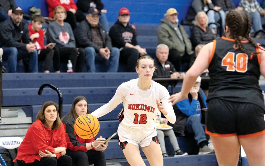 Nokomis' Natalie Brownback looks for an opening in the South Fork defense during the Redskins' regional semifinal game in White Hall on Tuesday, Feb. 18. Brownback scored 12 points, had six rebounds and four assists in Nokomis' 66-32 victory over the Ponies, which punched their ticket to Friday's regional championship game at North Greene High School.