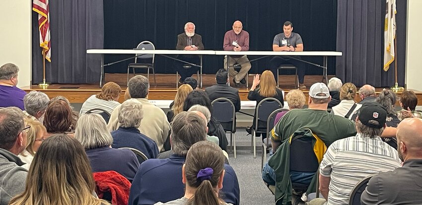 A large crowd gathered in the auditorium at Lincoln Land Community College in Litchfield on Tuesday, March 4, to hear from those who wish to represent them as the April 1 election day draws closer. The Litchfield Chamber of Commerce hosted this year&rsquo;s political forum, giving candidates for mayor, city council and school board the opportunity to share their views. Above, moderator Candi Mazza goes over the rules of the forum with mayoral candidates, from the left, Dwayne Gerl, David Hollo and Jacob Fleming.