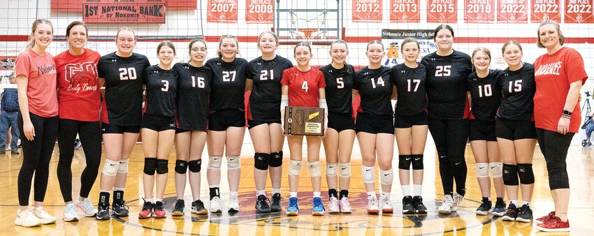 The Nokomis eighth grade volleyball team denied South Central a return trip to state and won an IESA regional championship on March 13, as they defeated the Lady Falcons 25-19, 25-22 in Nokomis. From the left are Coach Emily Cress, Coach Krystal West, Lauren DeWerff, Ripley Goodwin, Natalie Graden, Madi Marshall, Leni Johnston, Addi Cress, Avry West, Kennedi Aumann, Addy Gillock, Kinlee Bennett, Brynn Greff, C.J. Yeske and Coach Rebecca West. To make it to state, the Lady Braves will have to knock off another team hoping to get back to the tournament, Bunker Hill Wolf Ridge, who are 18-1-1 and won the IESA Class 7-2A state finals last year. Game time is 6:30 p.m. at Central A&amp;M Middle School in Assumption on Monday, March 17.