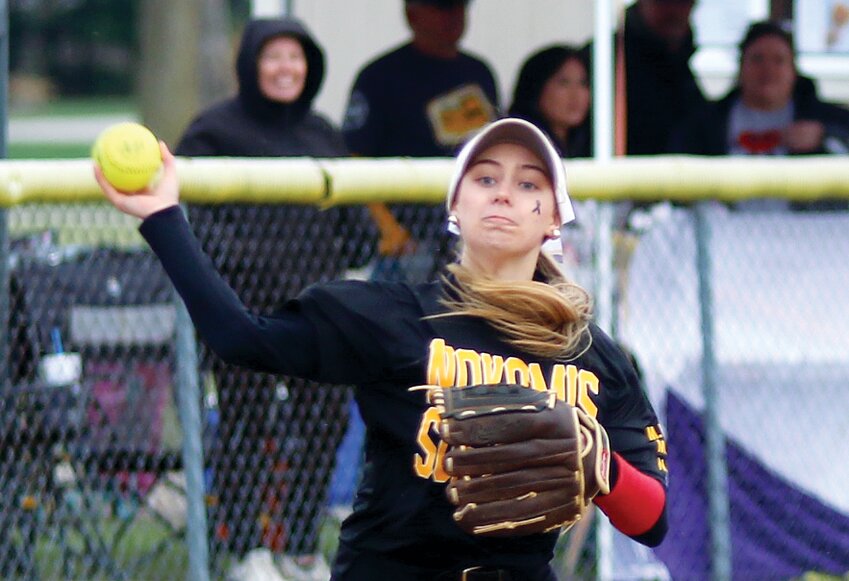Sporting a black and gold jersey and a cancer ribbon on her cheek in support of the Montgomery County Cancer Association, Nokomis senior Grace DeWerff prepares to make the throw from short during the Lady Redskins' 6-5 come from behind wind against North Mac. The second annual fundraiser also featured a food truck and a silent auction, with funds going to Stamp Out Cancer via the Super Spencer Squad.