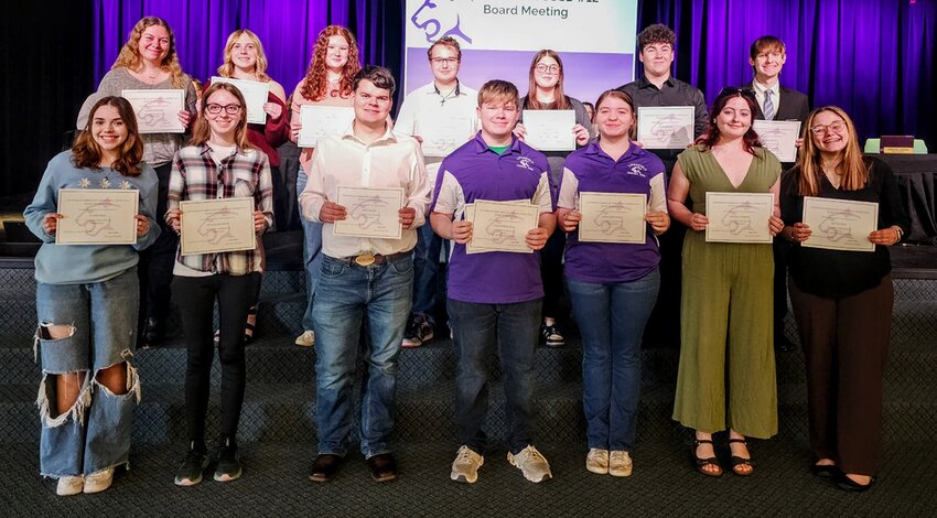 Litchfield musicians honored at the school board meeting, in front, from the left are Claire Reid, Savannah Roach, Josh Bader, Lukus Middleton, Hannah Phillips, Bristol Everett and Olivia Reid. In back are Cassie Loveless, Samantha Rieke, Janet Mazza, Wesley White, Summer Wilson, Devin Hansel and Derek Sawyer.
