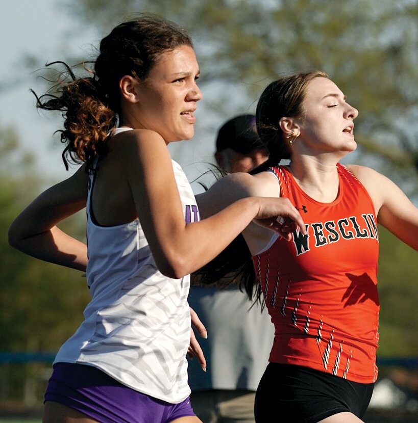 Litchfield's Alex Gasperson took first in the 800 meters at the Comet Open in Greenville on Tuesday, April 22, finishing almost simultaneously with Wesclin's Raya Toennies. Gasperson's win was one of six victories on the day for the Lady Panthers, who finished second to Wesclin by eight points, 59-51.