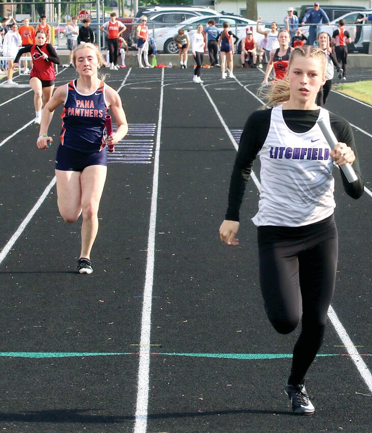 Litchfield's Izabella Fenton stretches out her team's lead  over Nokomis (anchor Chloe Smoot) and Pana (anchor Lilly Jostes) as she closes in on the finish line for the 4x100 meter relay at the Panthers' home meet on Friday, May 9. Fenton and the Panthers won the race with a time of 53.6 seconds.