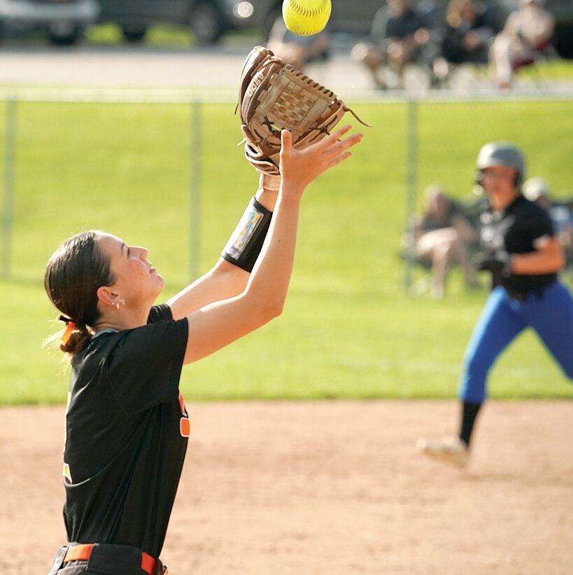 Hillsboro senior Ella Greenwood takes care of a pop up to short during the Lady Hiltoppers regional semifinal game against Greenville on Tuesday, May 20. Greenwood scored a run and drove one in during the Toppers' 4-3 win over the regional hosts, which earned them a shot at a regional title on Friday, May 23.