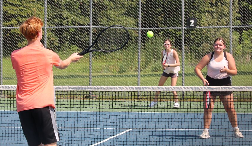 Mark Mattson of Hillsboro returns a shot during his and Aubrey Reincke&rsquo;s match with Chloe Martincic and Zoey Spinner (right) during the 2024 Old Settlers Tennis Tournament at the Hillsboro Sports Complex. Mattson and Reincke went on to win the eight-team doubles tournament, which will be just doubles this year, on Aug. 2-3, in Hillsboro.