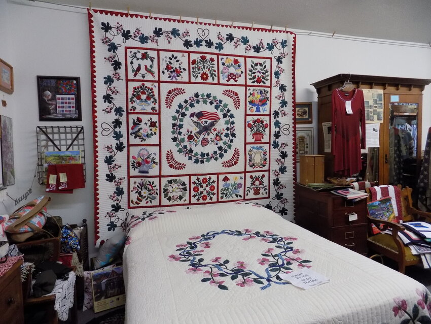 The quilt hung on the wall shown here will be among the most expensive offered at the Quilt Show.