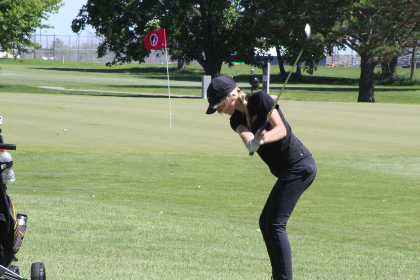 Mid-Prairie senior Gabi Robertson hits an approach shot to the green during the 2A State Championships at Cedar Pointe Golf Course in Boone.