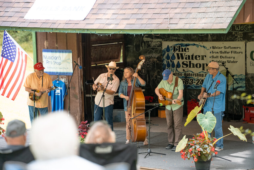 The Burlington Street Bluegrass Band of Iowa City performs at the 38th Annual Kalona Bluegrass Festival at Windmill Ridge Campground on the afternoon of Saturday, July 20.