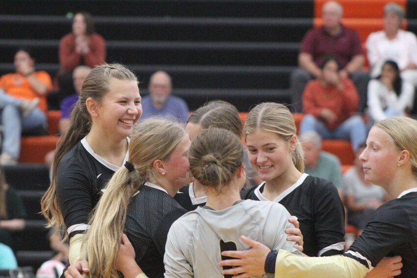 Mid-Prairie's players celebrate a point scored against Washington.