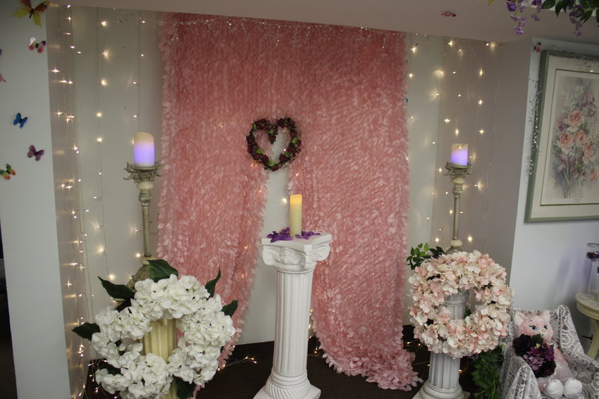 The interior of the Long Island Wedding Chapel, located at 124 Medford Avenue, Suite C, features flower designs, lights and more, and can be customized for each couple. 