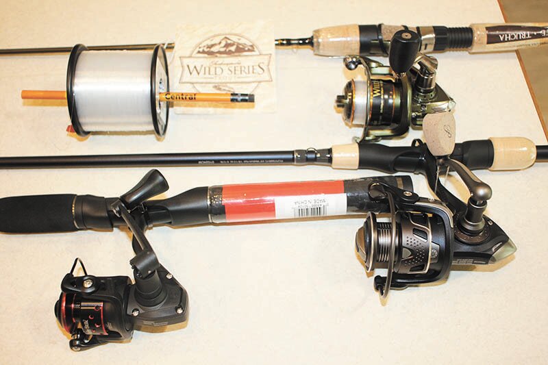 I've got three new crappie rods/reels for this Spring that needed spooled up. Notice how I stick a pencil in the spool so I can reel line off of it.