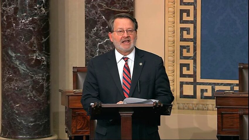 In this image from video, Sen. Gary Peters, D-Mich., speaks on the Senate floor at the U.S. Capitol in Washington, Wednesday, March 25, 2020.