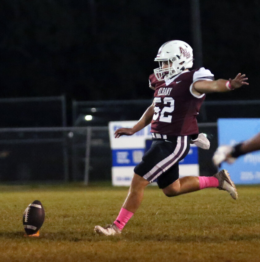 Albany's Jordan Rowell (52) on the kickoff after the Hornets score in a win over Jefferson Rise Charter.