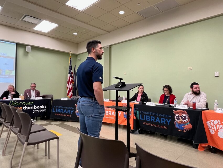 JAMES LACHNEY, project manager for Arkel Co., addresses the Livingston Parish Library Board of Control Tuesday. Lachney and board members discussed the proposed construction of a retaining wall at the Albany-Springfield Branch Library to prevent the accumulation of mud on an outdoor meeting area of the library.