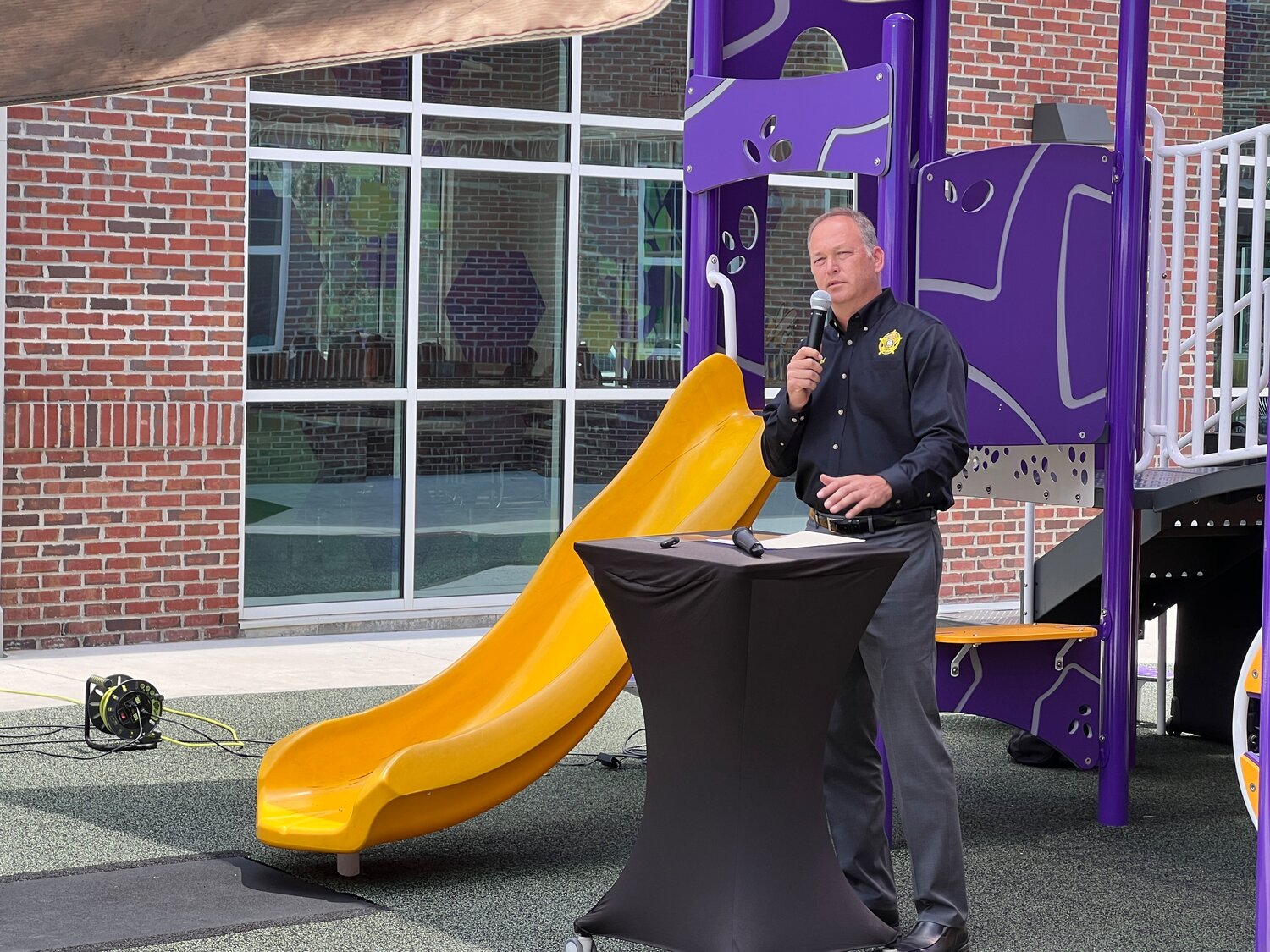 Students, faculty, and local officials dedicate school bench to fallen ...