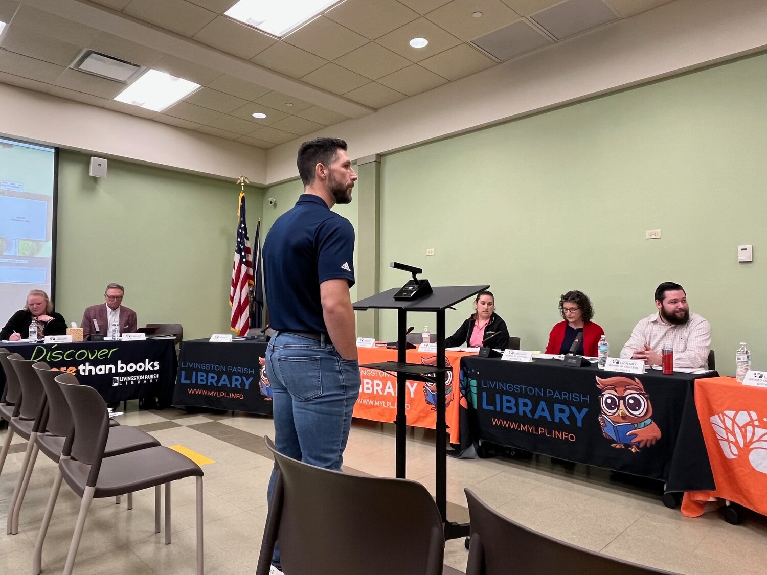 JAMES LACHNEY, project manager for Arkel Co., addresses the Livingston Parish Library Board of Control Tuesday. Lachney and board members discussed the proposed construction of a retaining wall at the Albany-Springfield Branch Library to prevent the accumulation of mud on an outdoor meeting area of the library.