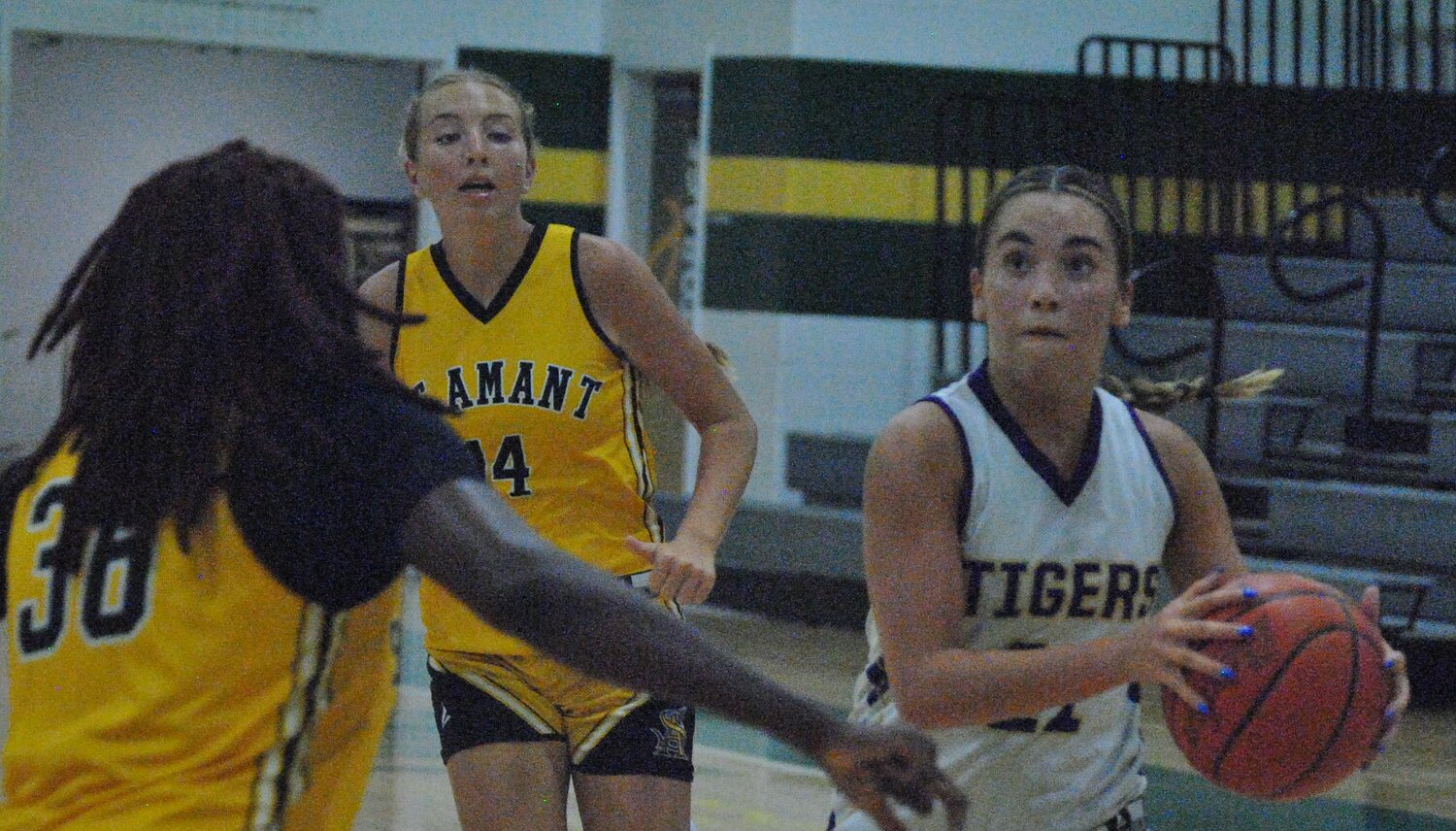 Doyle' Blakelyn McMorris goes against a defender during their game on June 12.