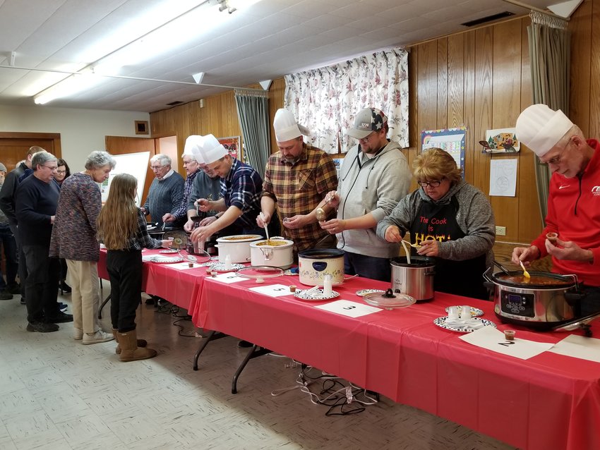 The eight chili chefs were not allowed to serve their own chili but offered samples for the people's choice voting and bowls once a favorite was picked.  Macaroni and cheese was also offered along with the usual chili toppings.