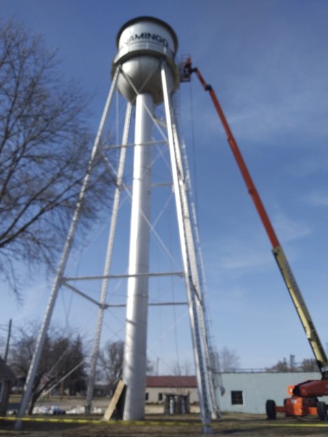 The crew taking down the water tower