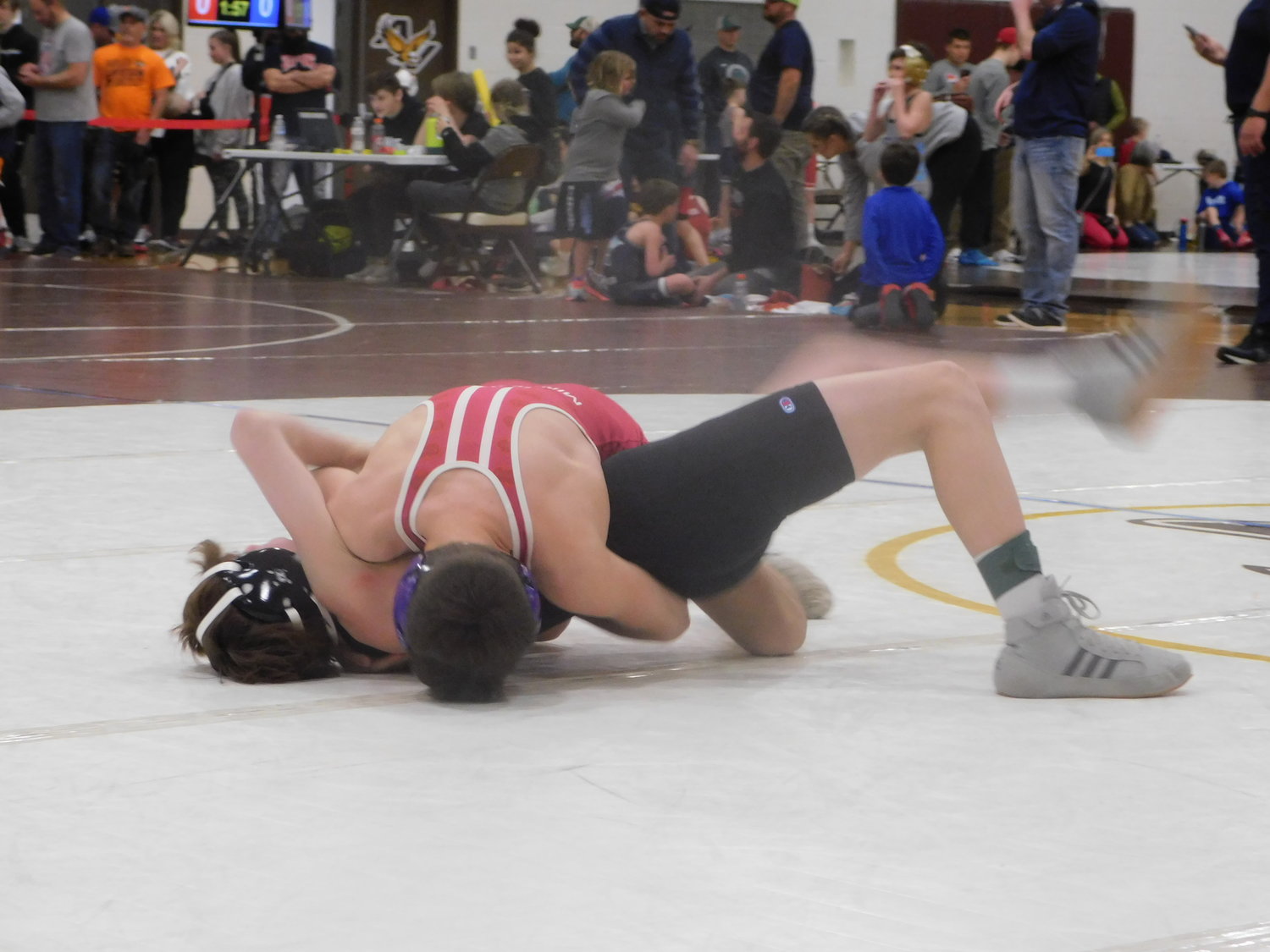 Hayden Holm of Goodhue pinning his opponent at the Apple Valley Open.  Hayden placed 2nd.