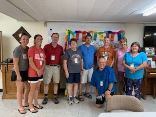Those who helped coordinate and teach at St. Peter's Vacation Bible School were: (L-R) Christina Lexvold, Karla Ryan, Pastor Martin Weigand, Judy Vieths, Scott Hinsch, Emily Raasch, Deb Hinrichs, Shelley Poncelet, and Pastor Robbin Robbert (kneeling).  Not pictured are piano players Kathy Weigand and Lillian Raasch.
