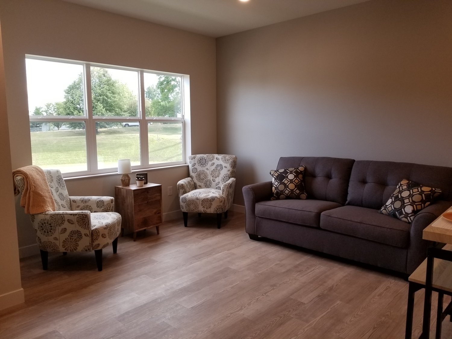 A staged living area of an apartment in the new Goodhue Living Senior Community.