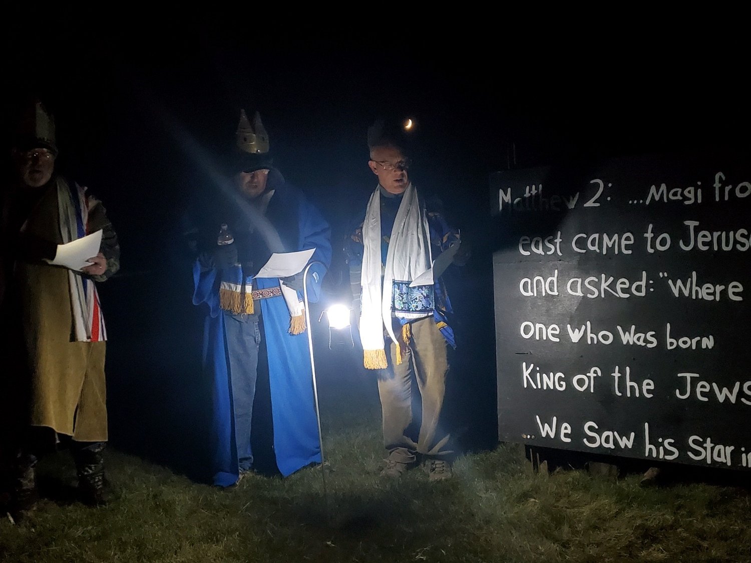 Sign boards and members in costume shared the message of Christ's birth with those that drove through the live nativity event.