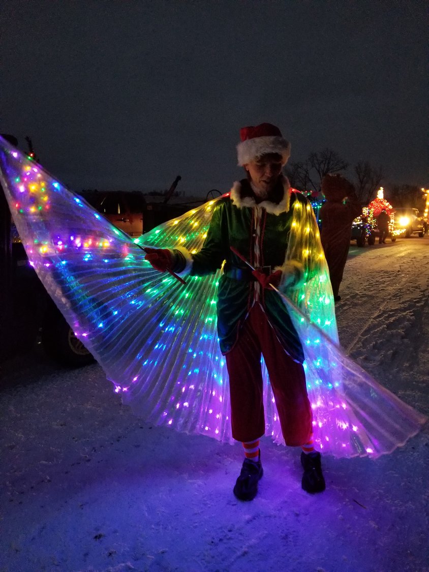 Jody Gordon walked the parade route in a lighted elf costume that she made herself.