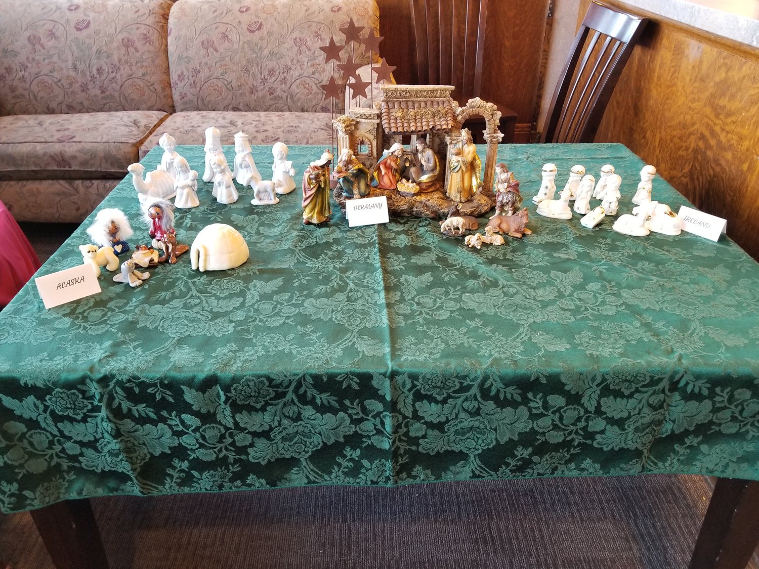 Nativity scenes from around the world were on display inside The Third Place.  These carved wood sets were among many different types displayed on tables and the near life-size set was produced in 1957.