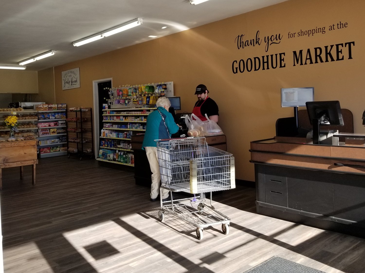 The newly refreshed Goodhue Market has a more open look and feel inside the doors and around the new checkout lanes.