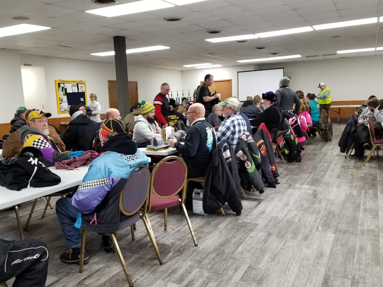 The annual vintage snowmobile show and ride drew a big crowd.  Those attending gathered inside the Lion's building for lunch, door prizes and awards.
