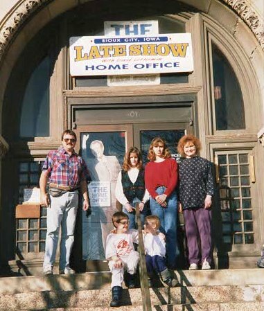 Emery and his family posed in front of City Hall in Sioux City, Iowa which was home to David Letterman's Home Office in the early 1990's.  Emery was a farm broadcaster at KMNS and KOLK radio from 1990 to 1997.