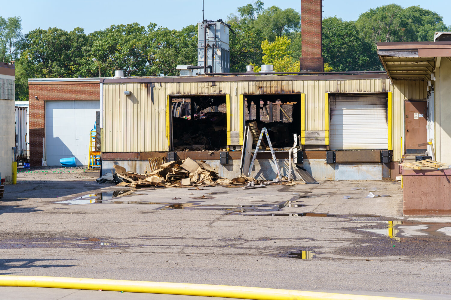 This loading dock was primarily used by trucks returning to the creamery with empty crates when the creamery was in operation. As you can see from the image, there are piles and piles of cardboard boxes on the docks that added to the fuel for the fire.