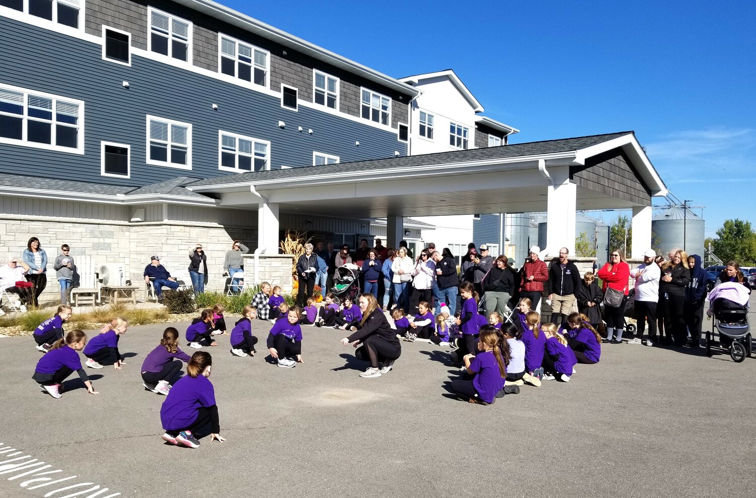 group of young Just For Kix dancers prepare to start their routine.  Visitors enjoyed a number of entertainment options at the Goodhue Living property on October 15th.  See more pictures on their Facebook page, https://www.facebook.com/GoodhueLiving.